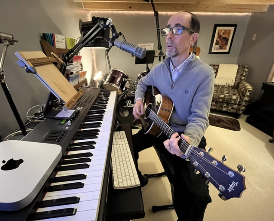 Jim West on Piano, Guitar and Voice